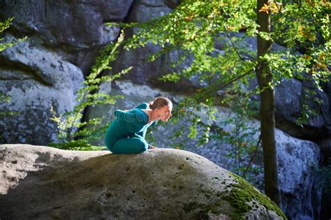 Woman Practicing Yoga Outdoors In Forest Barefoot Female On Yoga Mat