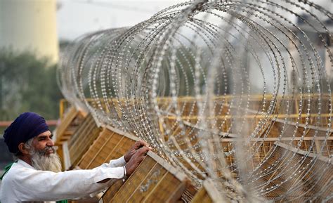 Farmers Protest Delhi Police Starts Removing Barricades At Tikri