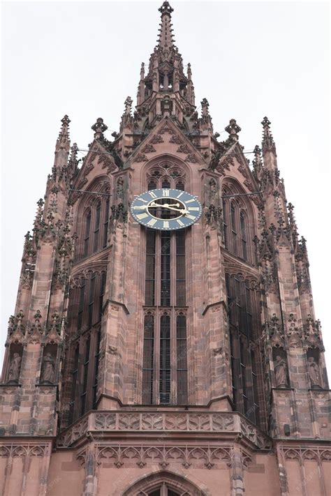 Premium Photo | Cathedral tower and clock in frankfurt, germany