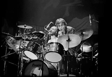 Phil Collins And Peter Gabriel Behind The Drum Kit Photo By Billy