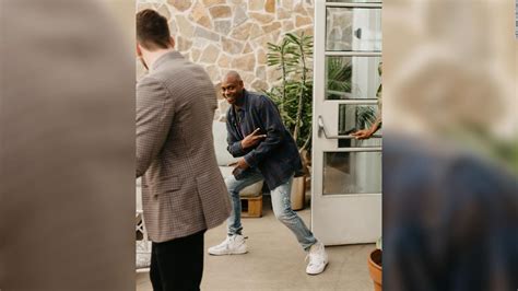 Dave Chappelle photo-bombed a couple's 'first look' wedding photos - CNN