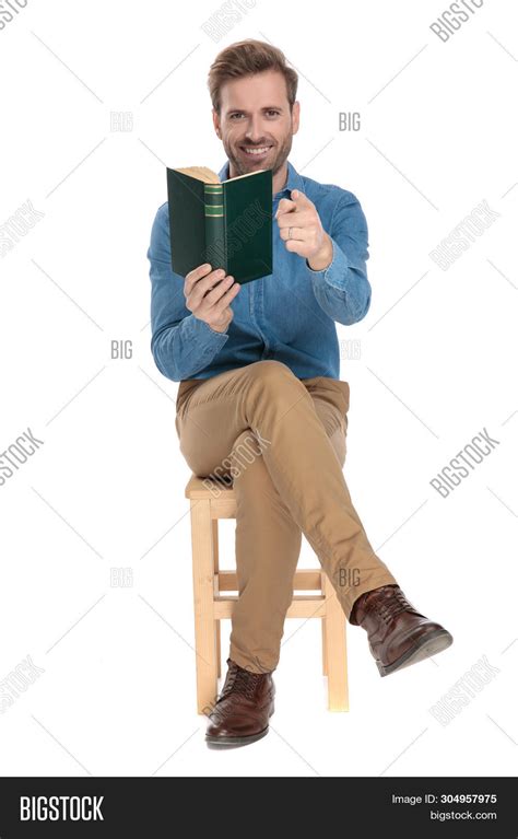 Man Sitting In Chair Legs Crossed