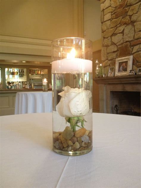 Submerged White Rose Candle With River Rocks