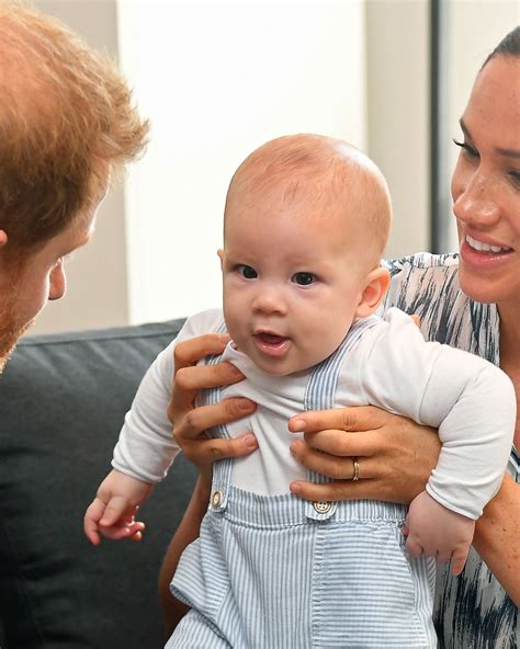 Baby Archie Looks Just Like Prince Harry See Their Baby Photos Side By