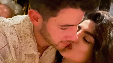 Priyanka Chopra Nick Jonas Welcome New Year With A Kiss Twin In White