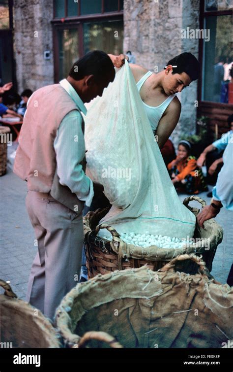 Silk Farmers Weigh Bags Of Silk Cocoons At The Silk Cocoon Market Held