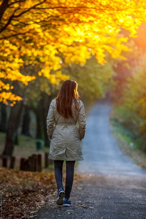 Woman Walking In Autumn Forest By Stocksy Contributor Alexandra Bergam Stocksy