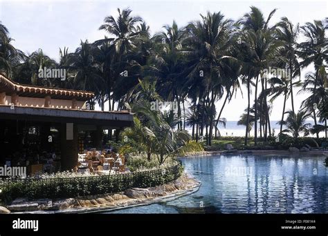 Swimming pool of hotel on beach in Acapulco, Mexico Stock Photo - Alamy