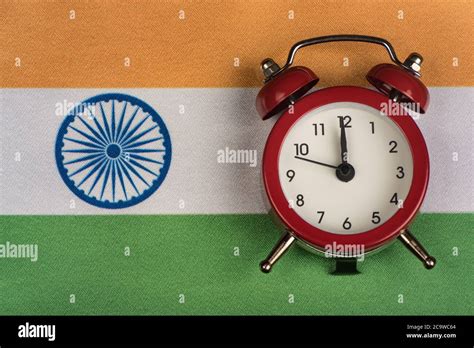 Flag of India and the old alarm clock. Traveling to India. Time to learning Indian Stock Photo ...