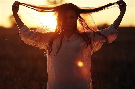 Premium Photo Girl With Long Hair At Sunset In The Field