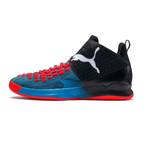 The Puma Shoes Are Blue And Black With Red Accents On The Upper Part Of