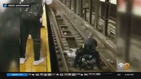 Video Shows Nypd Officer Good Samaritan Rescuing Man From Subway