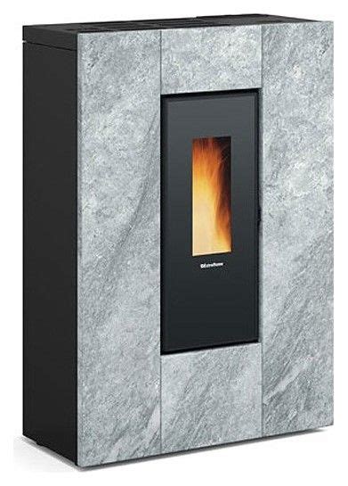 A White Marble Fireplace With A Black Door And Yellow Flame In The