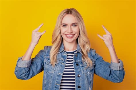 Premium Photo Portrait Of Cheerful Crazy Rock Fan Girl Make Horns