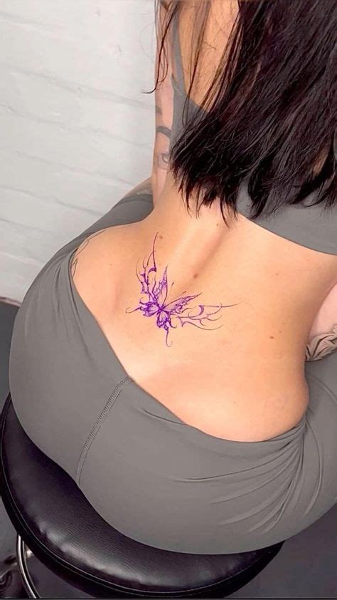 Tramp Stamp Tatoos For Womens Lower Back Tattoos Strength Tattoo