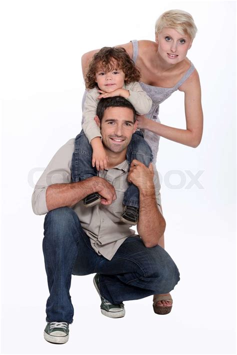 Junge Familie Posiert Im Studio Stock Bild Colourbox