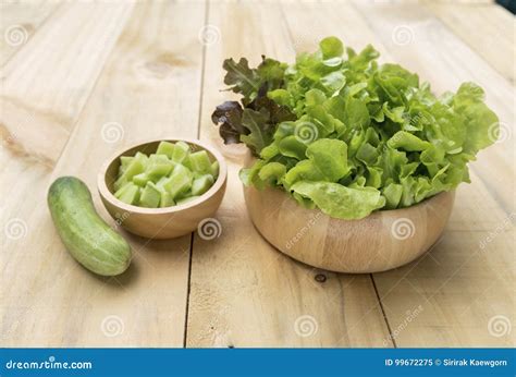 Fresh Lettuce and Slice Cucumber in Wooden Bowl Stock Image - Image of ...