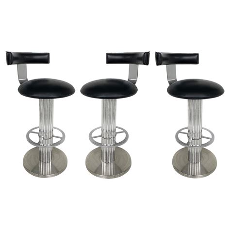 Set Of Three Excalibur Brass Bar Stools With Suede Seats By Design