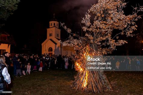 The Traditional Orthodox Christmas Ritual Of Burning Yule Log Stock Photo - Download Image Now ...