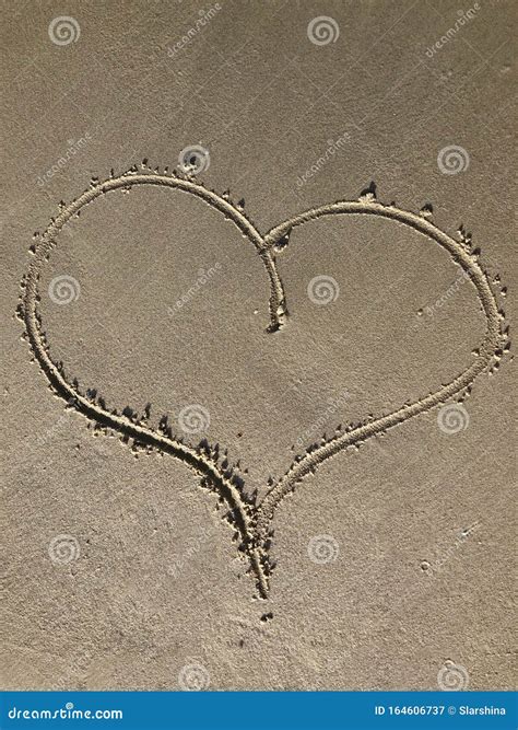 A Simple Heart Drawn In The Sand Simple Stylish Design Element Stock