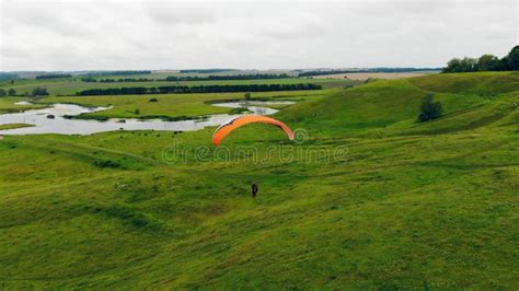 A Person is Flying the Parawing in a Top View Stock Footage - Video of ...