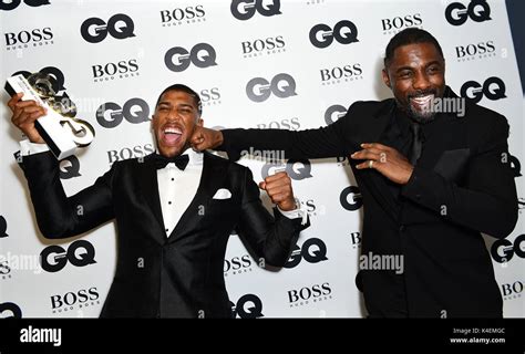 Anthony Joshua (left) with his Best Sportsman award poses with Idris ...