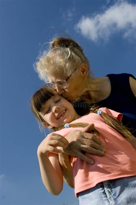 Grandma Kissing Her Granddaughter Royalty Free Stock Images Image