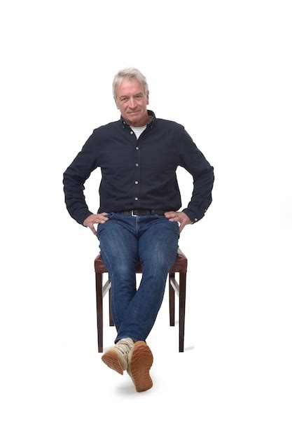 Premium Photo Man Sitting On White Background