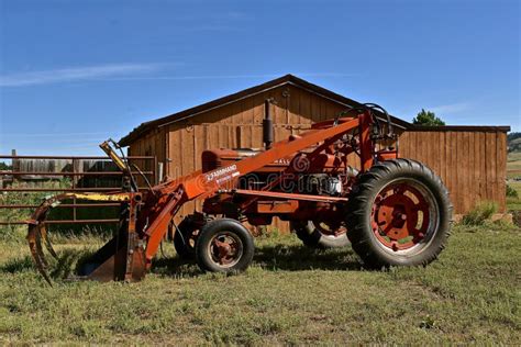 Farm M Tractor With A Farmhand Front End Loader Editorial Photography