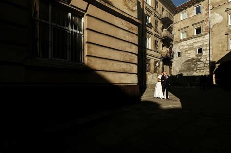 Premium Photo Happy Gorgeous Bride And Stylish Handsome Groom Posing