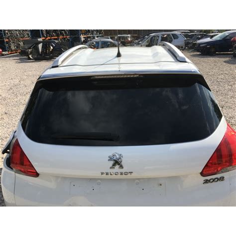 EMBLEMAT KLAPY BAGAŻNIKA PEUGEOT 2008 13