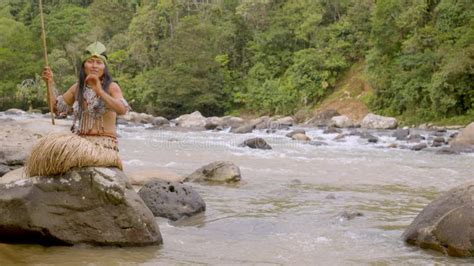 Tribe Woman Fishing in River Stock Footage - Video of tribal, sitting ...