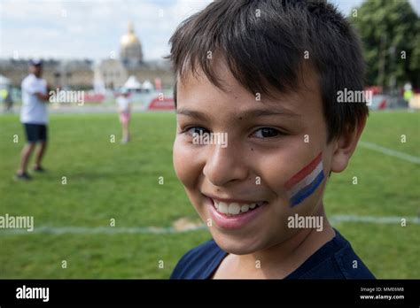 Smiling 11 Year Old Boy With A French Flag Tatoo Paris Hi Res Stock