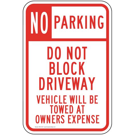 White Reflective Sign Do Not Block Vehicle Will Be Towed Surface