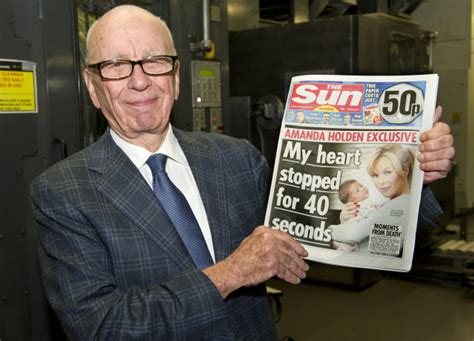 Rupert Murdoch's Sun tabloid 'quietly' drops topless women from Page 3