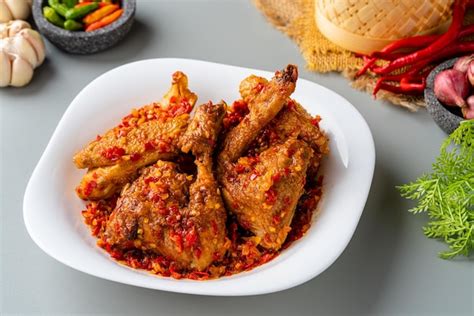 Premium Photo Ayam Sambal Balado Or Spicy Fried Chicken Is Traditional Food From Padang West