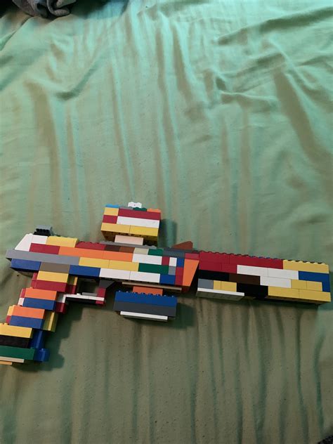 I made a Desert Eagle with some various attachments. : lego