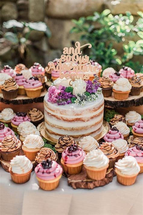 Semi Naked Wedding Cake Surrounded By Cupcakes Wedding Ceremony Venues