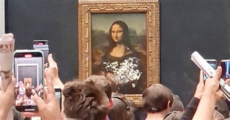 Mona Lisa smeared with cake in apparent climate protest at the Louvre ...