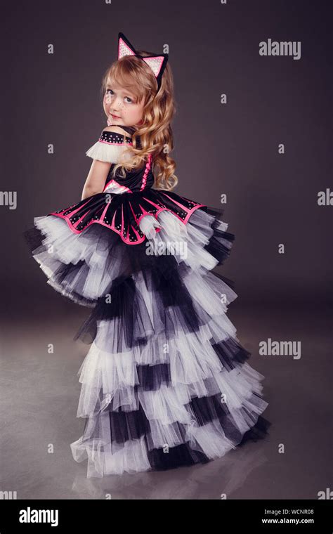 girl in a dress with cat ears Stock Photo - Alamy