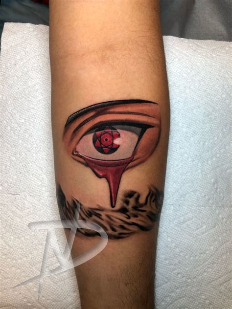 Itachi Sharingan Tattoo