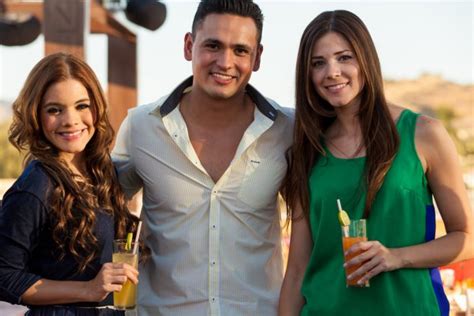 Happy Latin friends having drinks - Stock Image - Everypixel