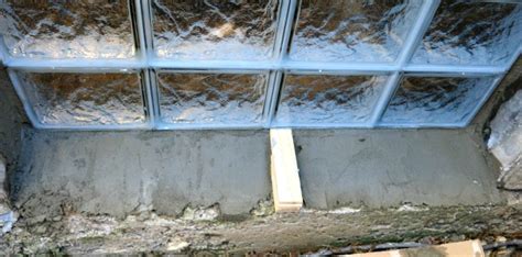 Glass block window installation for a basement window