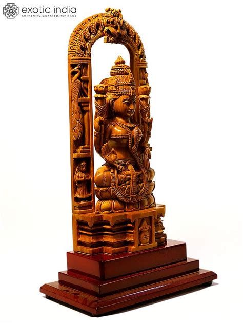 Goddess Lakshmi Seated On Kirtimukha Throne Sandalwood Carved