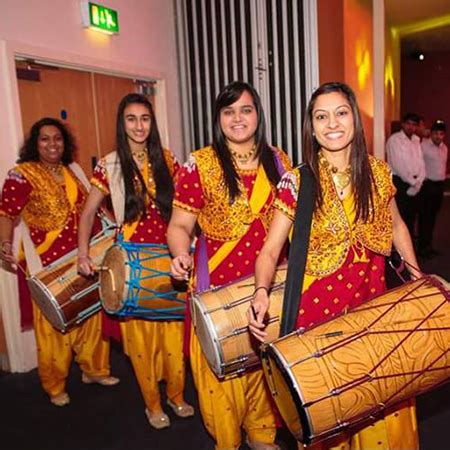 Female Dhol Players - Traditional Indian Drummers | Scarlett ...