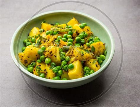 Image Of Aloo Matar Ki Sookhi Sabzi Indian Dry Potato Green Peas