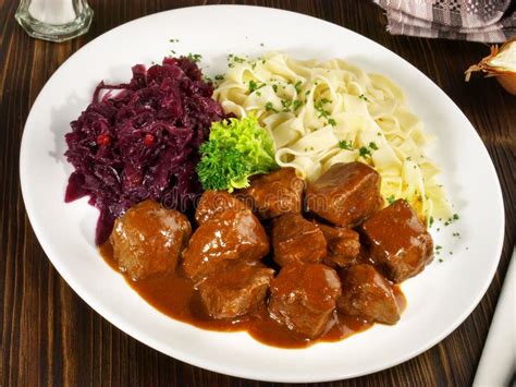 German Beef Goulash with Noodles Stock Image - Image of cranberry ...