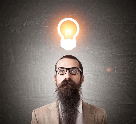 Premium Photo Baffled Man With Glowing Light Bulb