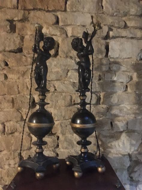 Proantic Pair Of Large Cast Iron Lamps With Putti Decor