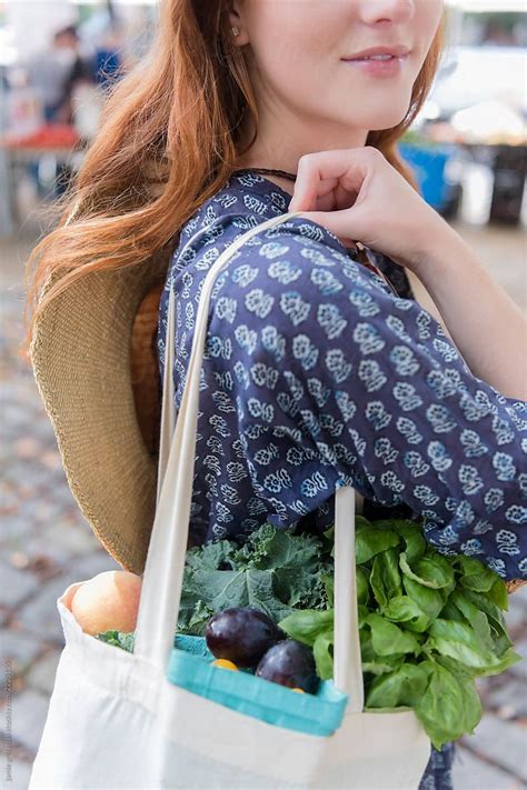 Woman Holding Farmer S Market Bounty By Stocksy Contributor Jamie Grill Atlas Farmers